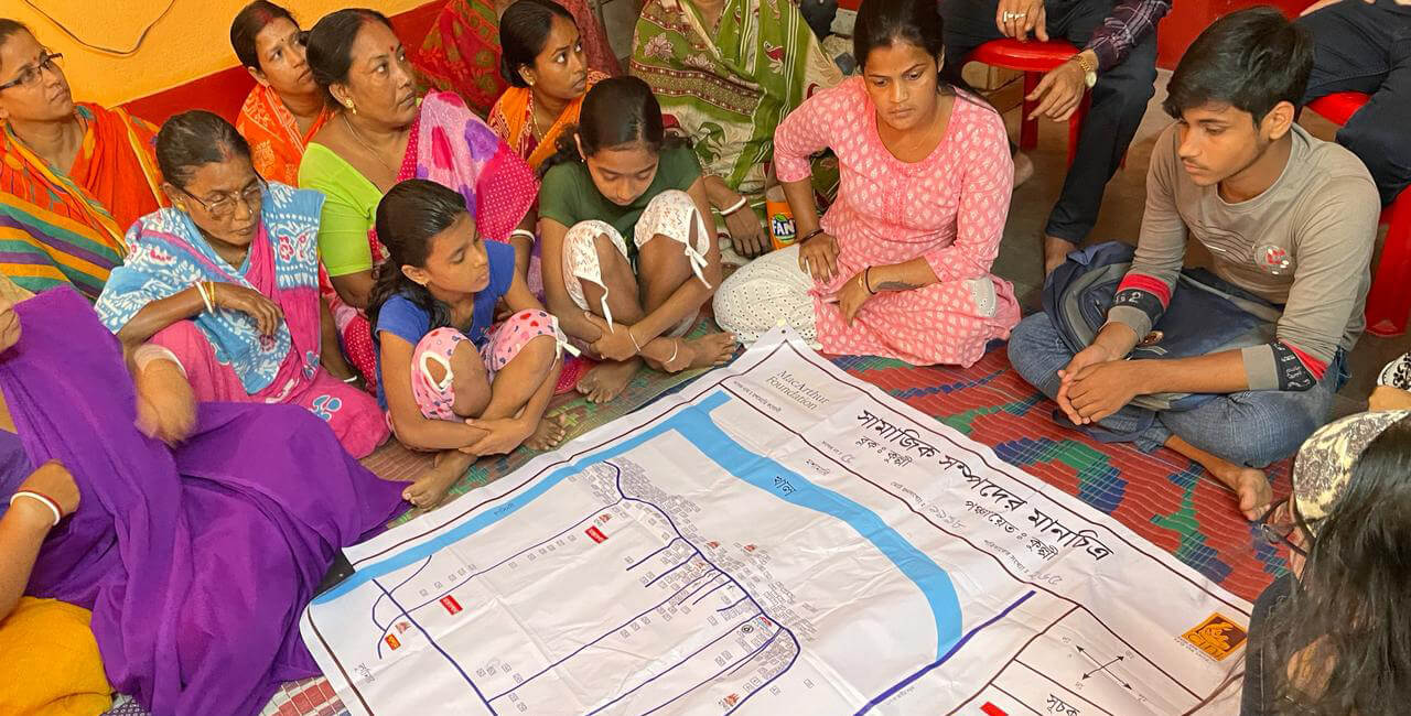 People sitting at a meeting to discuss children's rights